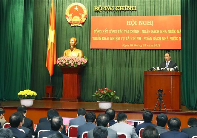 Prime Minister Nguyen Xuan Phuc speaks at a conference held by the Ministry of Finance in Hanoi on January 8 (Photo: VNA)