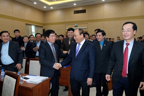 PM Nguyen Xuan Phuc attends a meeting to review works in 2017 and realize tasks in 2018 of the construction sector, Ha Noi, January 16, 2018 - Photo: VGP/Quang Hieu