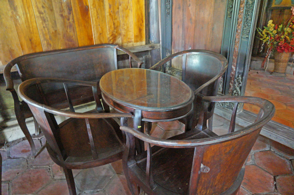 Another wooden sofa set in the house