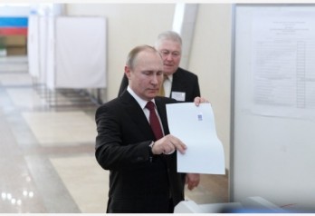 Putin wins another six years at Russia's helm in landslide victory