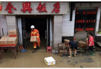 China floods wreak havoc, block roads and railways; more rain due