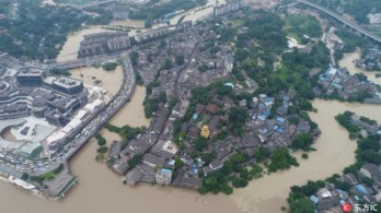 Nearly 100,000 residents evacuated before flood peak passes Chongqing