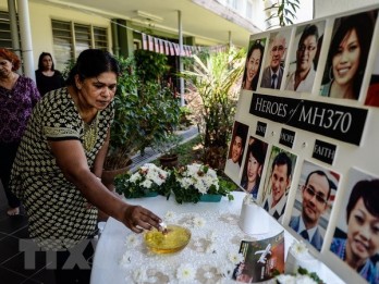 Malaysia to release report on missing flight MH370