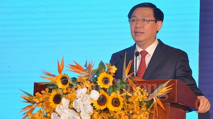 Deputy Prime Minister Vuong Dinh Hue addressing the event (Photo: congthuong.vn)