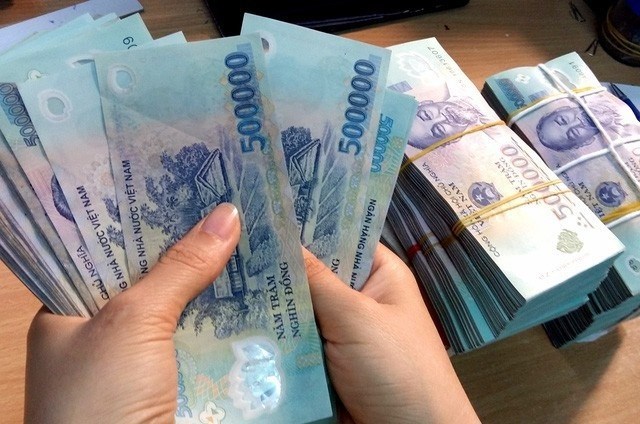 The daily reference exchange rate was set at 22,905 VND per USD on February 20 (Photo: VNA)