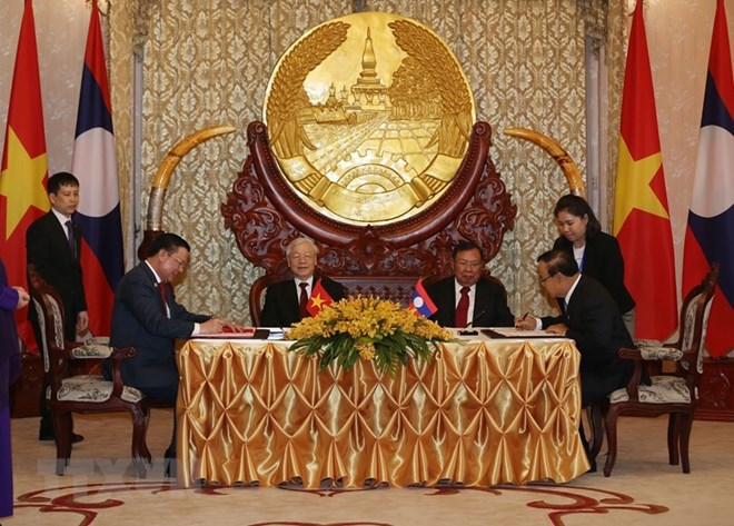 General Secretary of the Communist Party of Vietnam (CPV) Central Committee and President Nguyen Phu Trong held talks with his Lao counterpart Bounnhang Vorachith in Vientiane on February 24 