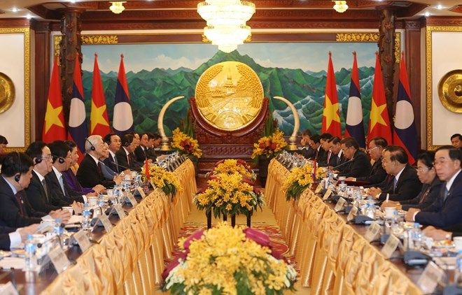 At the talks between General Secretary of the Communist Party of Vietnam Central Committee and President Nguyen Phu Trong and his Lao counterpart Bounnhang Vorachith in Vientiane on February 24 (Photo: VNA)