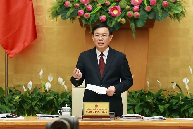 Deputy Prime Minister Vuong Dinh Hue, head of the central steering committee for the national population and housing census, addresses the teleconference in Hanoi on March 13 (Photo: VNA)