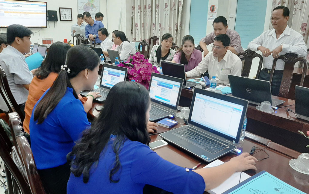 Practitioners work on computers