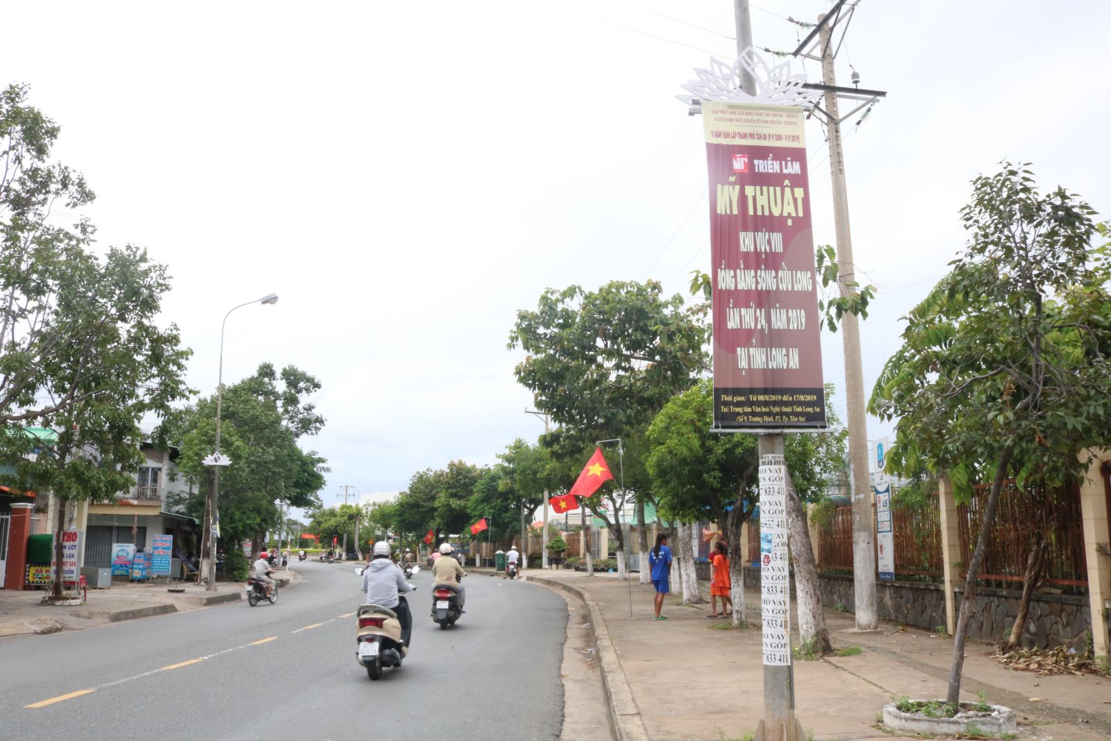 Propaganda pano hung on the streets of Tan An city