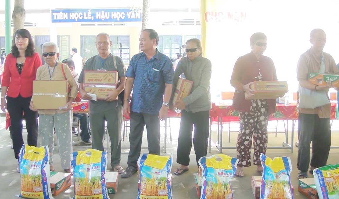 Gifts are presented to the blind