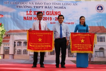 Former State President - Truong Tan Sang attends the opening ceremony of new school year at Hau Nghia High School