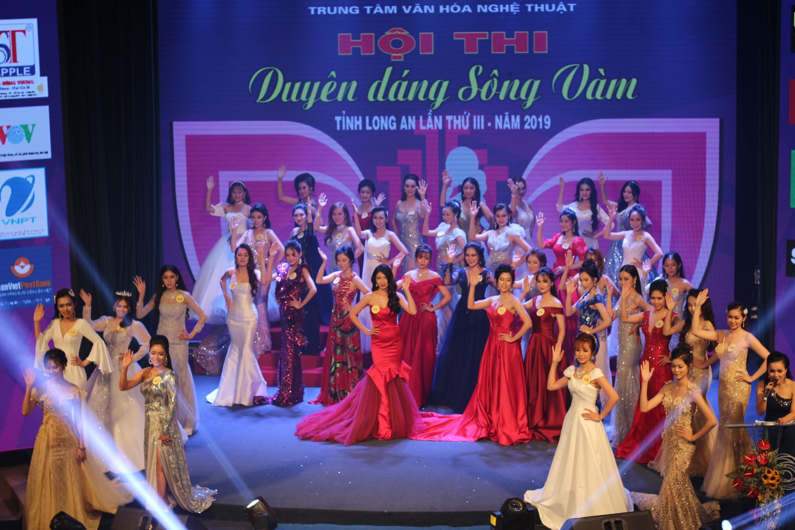 Candidates complete the evening dress competition