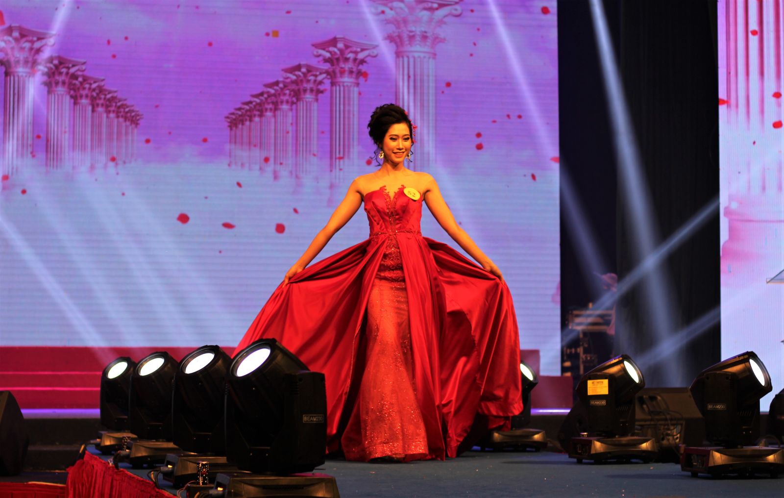 Candidates particiate evening dress competition