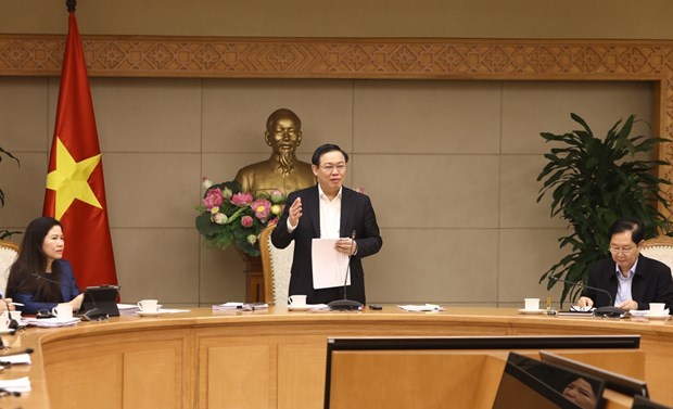 Deputy Prime Minister Vuong Dinh Hue speaks at a meeting on November 22 which reviews the implementation of a Party resolution on salary policy reform. (Photo: VNA)