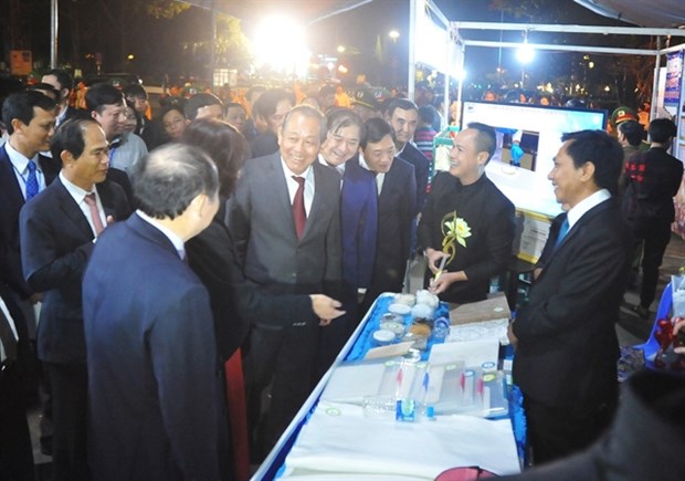 Deputy Prime Minister Truong Hoa Binh (C) attends the TechDemo 2019, co-organised by the Ministry of Science and Technology and the Gia Lai People's Committee (Photo: VNA)