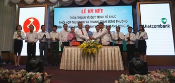 Vietcombank Long An signs coordination of budget collection and electronic bilateral payment