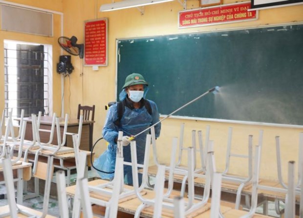 A classroom in Hanoi is sterilized. (Photo: VNA)