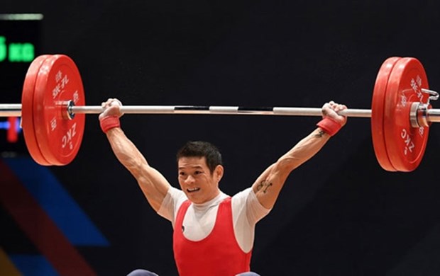 Weightlifter Thach Kim Tuan is expected to qualify for the Tokyo Olympics 2020 in the men’s 61kg category. (Photo 24h.com.vn)