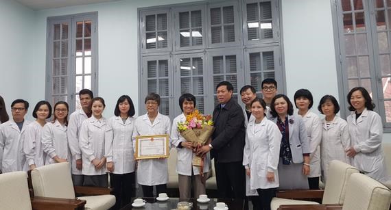 Scientists of the influenza laboratory under the virology department, the National Institute of Hygiene and Epidemiology (Photo: sggp.org.vn)