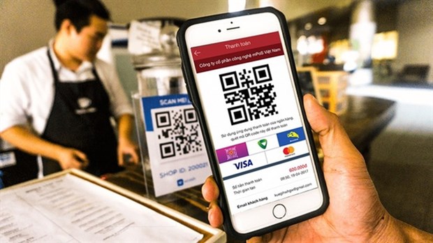 A payment via QR code. The coronavirus pandemic is highlighting the need for speeding up digital transformation. (Photo thuongtruong.com.vn)