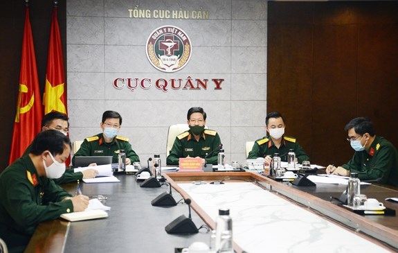 Vietnamese officers participate in the teleconference (Source: qdnd.vn)