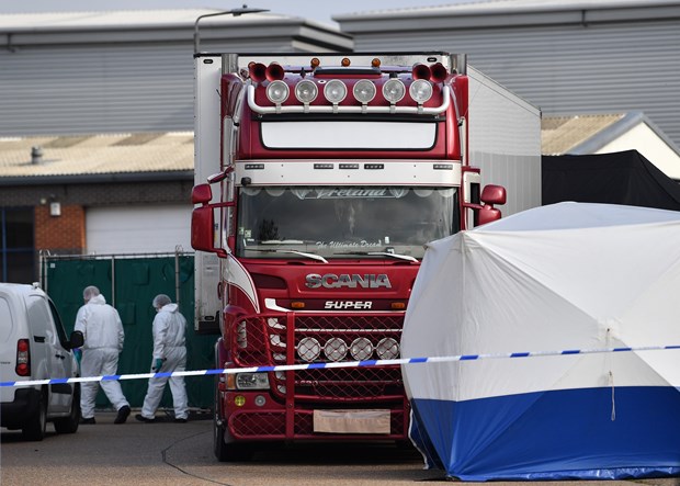 Police investigate the scene of the Essex lorry incident on October 23 (Photo: AFP/VNA)