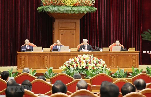 Party General Secretary and State President Nguyen Phu Trong (second from right) addresses the 12th plenum of the Party Central Committee (Photo: VNA) 