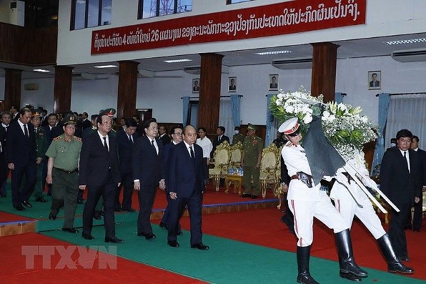 A high-ranking delegation of the Vietnamese Party and State led by Prime Minister Nguyen Xuan Phuc attends the state funeral of former Politburo member, former Prime Minister of Laos and former Chairman of the Lao Front for National Construction Central Committee Sisavath Keobounphanh (Photo: VNA)