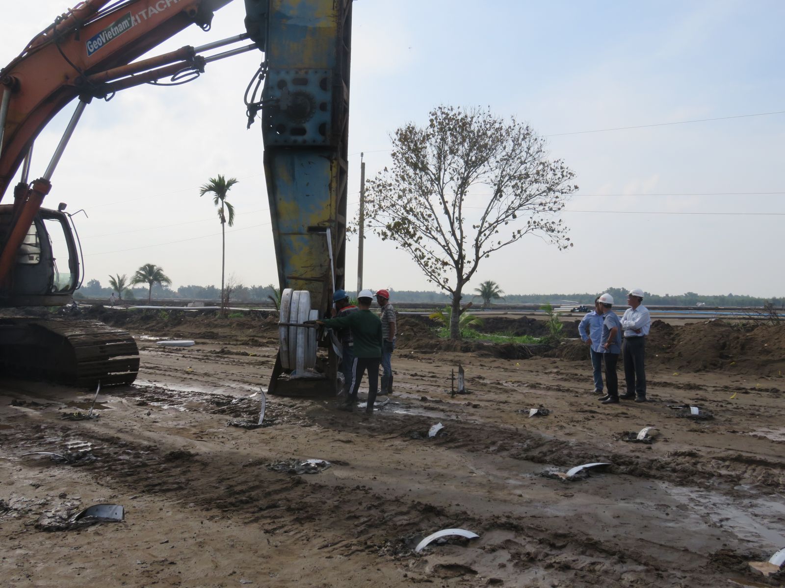 Workers construct access road to IP