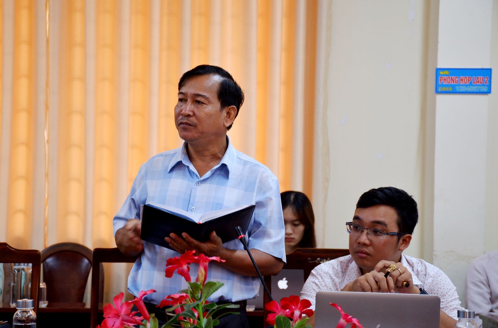 Reporters asks questions at the press conference