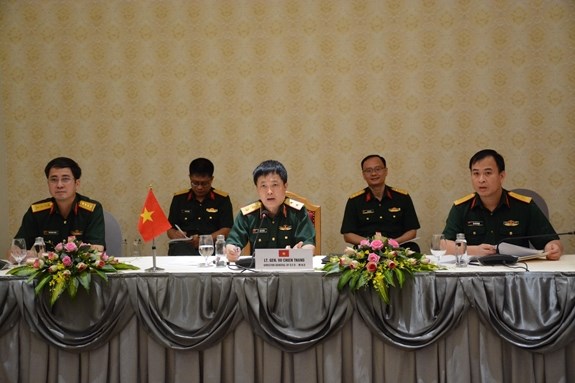 Director of the Foreign Relations Department at the Ministry of Defence Lieut. Gen Vu Chien Thang (centre) speaks at the virtual meeting (Photo: www.qdnd.vn)