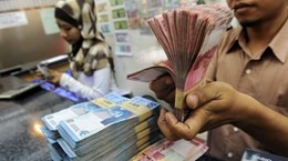 Indonesia to provide microloans for laid-off workers, housewives