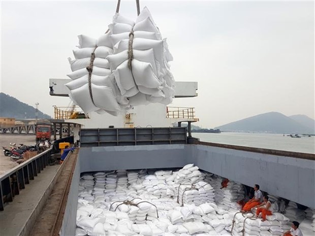 Bags of rice loaded onto a ship for export (Photo: VNA)