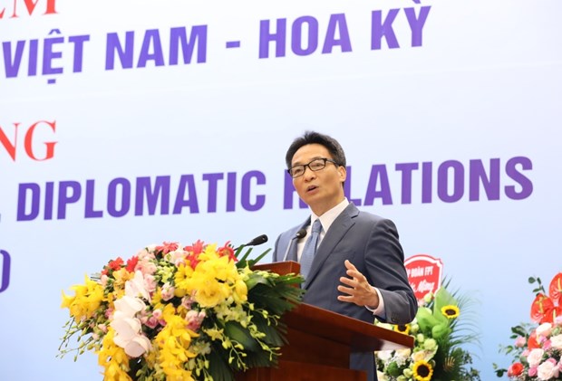 Deputy Prime Minister Vu Duc Dam addresses the event celebrating 25 years of Vietnam-US diplomatic relations in Hanoi on October 7 (Photo: VNA)