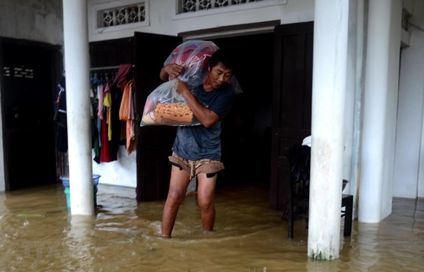 Severe flooding triggered by torrential rain has caused great losses in human and assets in the central region (Source: VNA)