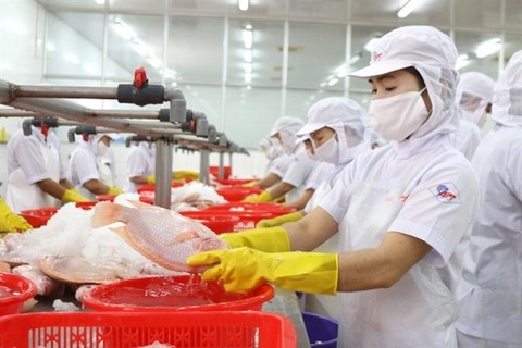 Businesses are working to ensure there is adequate supply of goods for Tet, especially of essential goods such as meat and rice. (Photo: nld.com.vn)