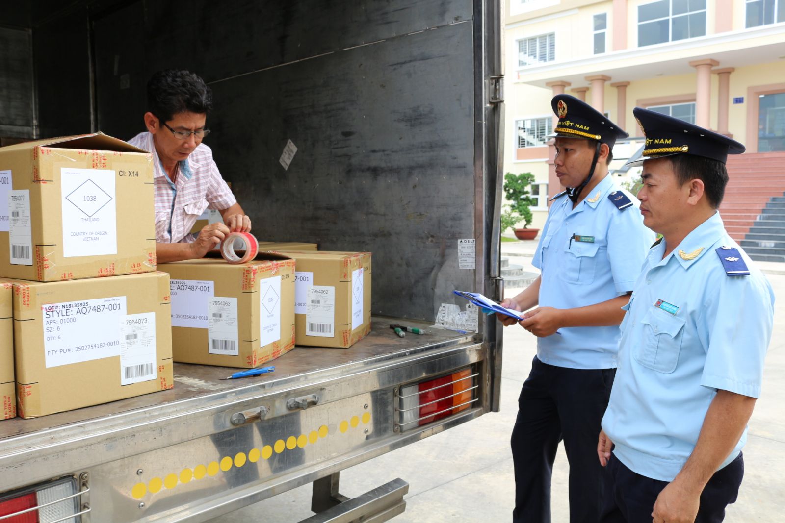 Customs officers carry out checking cargo clearance