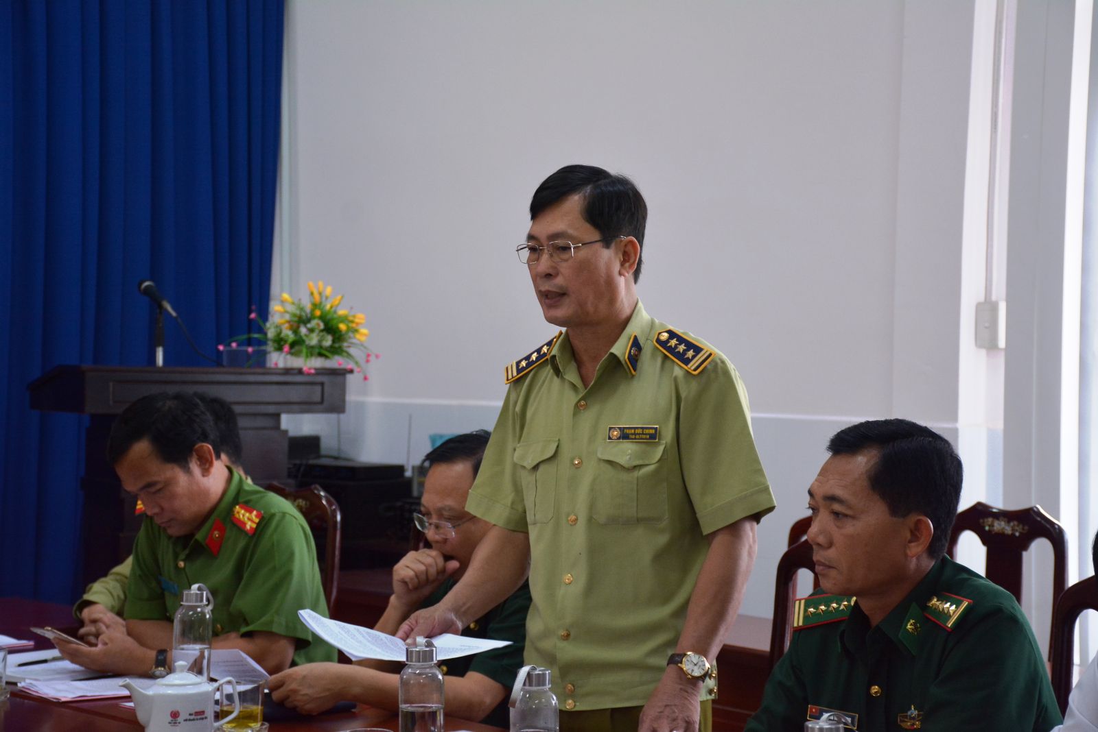 Director General of Long An Department of Market Management - Pham Duc Chinh reports the result of campaign against smuggling, trade fraud and fake goods of forces in localities before, during and after Lunar New Year of Buffalo 2021