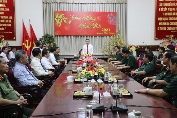 President of the Vietnam Fatherland Front Central Committee Tran Thanh Man speaks at a meeting with officers and soldiers of Military Zone 9. (Photo: VNA)