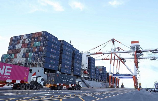 Unloading goods at Hai Phong International Container Terminal (Photo: VNA)