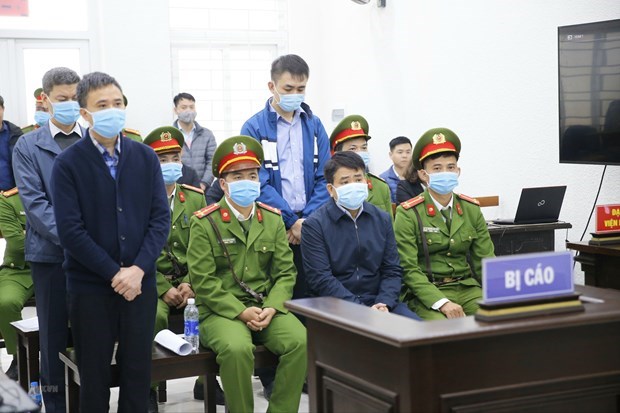 Defendants charged with "appropriating confidential state documents" relating to the case at the Nhat Cuong company at the first-instance trial in December (Photo: VNA)