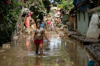 Over 5,000 flee homes as storm Dujuan hits southern