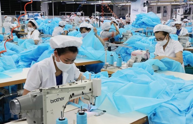 Female workers at a garment factory (Photo: VNA)