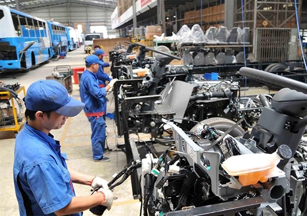 Assembling cars at Saigon Transportation Mechanical Corporation (Samco). (Photo: VNA)