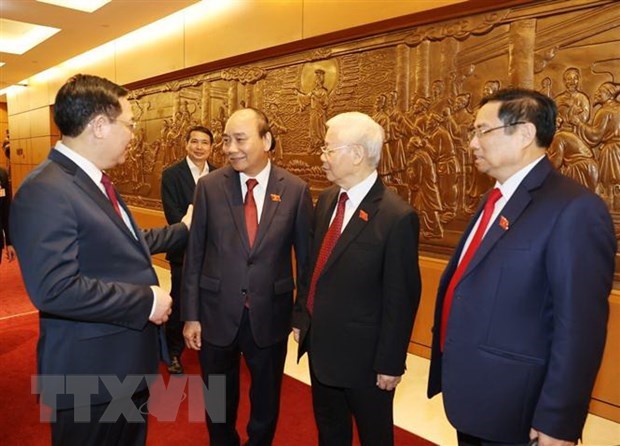 Party General Secretary Nguyen Phu Trong (second from right) poses and newly-elected State and National Assembly (NA) leaders of Vietnam at the closing ceremony of the 14th NA's 11th session (Photo: VNA)