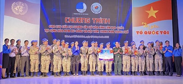 Representatives of Vietnamese peacekeepers and young people in HCM City at the exchange (Photo: VNA)