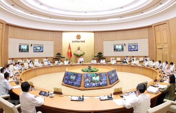 Prime Minister Pham Minh Chinh chairs the Cabinet's teleconference with localities (Photo: VNA)