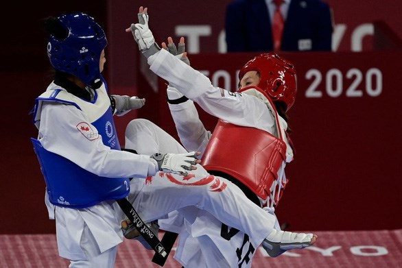 Truong Thi Kim Tuyen advances to the quarter-finals of the women's 49kg category taekwondo event. (Photo: AFP/VNA)