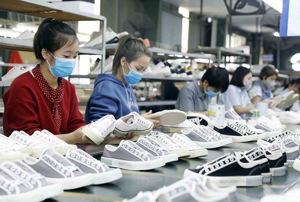 Workers at Ha Tay Chemical Weave Co.Ltd in Hanoi (Illustrative photo: VNA)